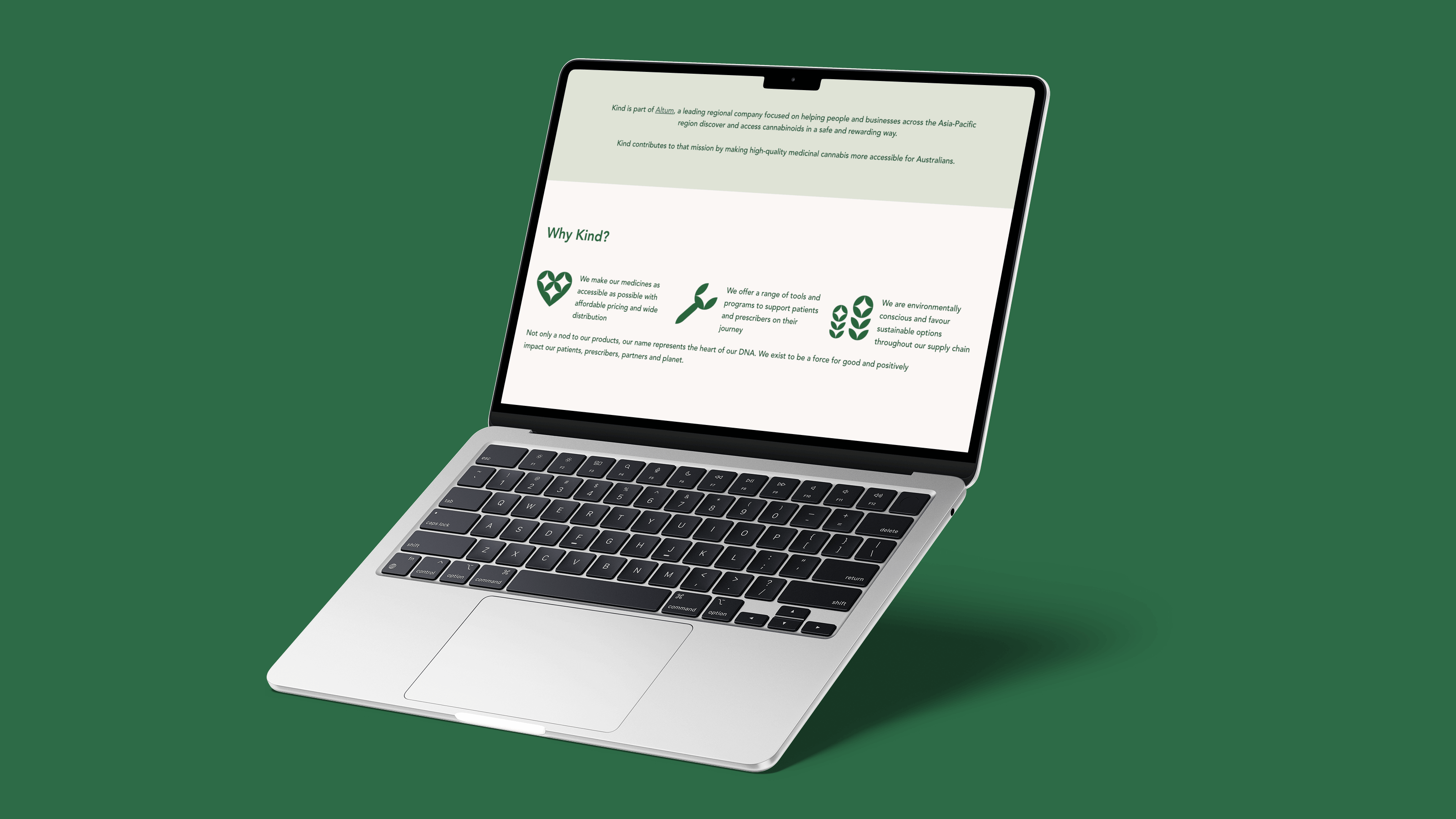 Kind Medical website shown on a MacBook with a deep green background